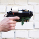 Illustration for article titled Guy invents an 8-Bit instant camera gun that prints images on receipts